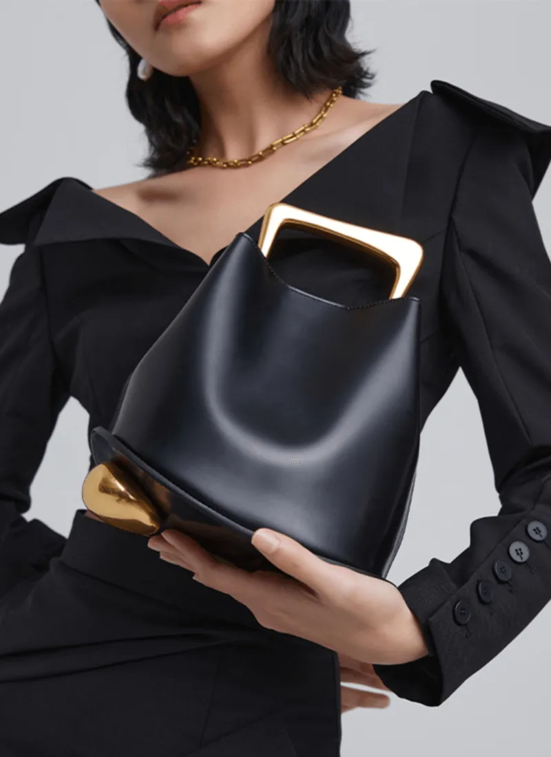 IT Ozzy Bag | Modern Chic Leather Shoulder Bucket Bag with Amber Acrylic Handles