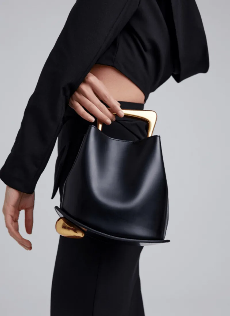 IT Ozzy Bag | Modern Chic Leather Shoulder Bucket Bag with Amber Acrylic Handles