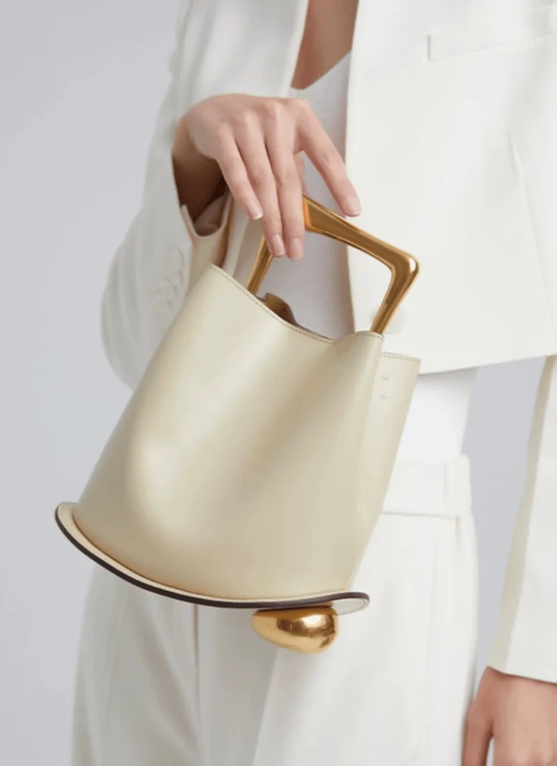 IT Ozzy Bag | Modern Chic Leather Shoulder Bucket Bag with Amber Acrylic Handles