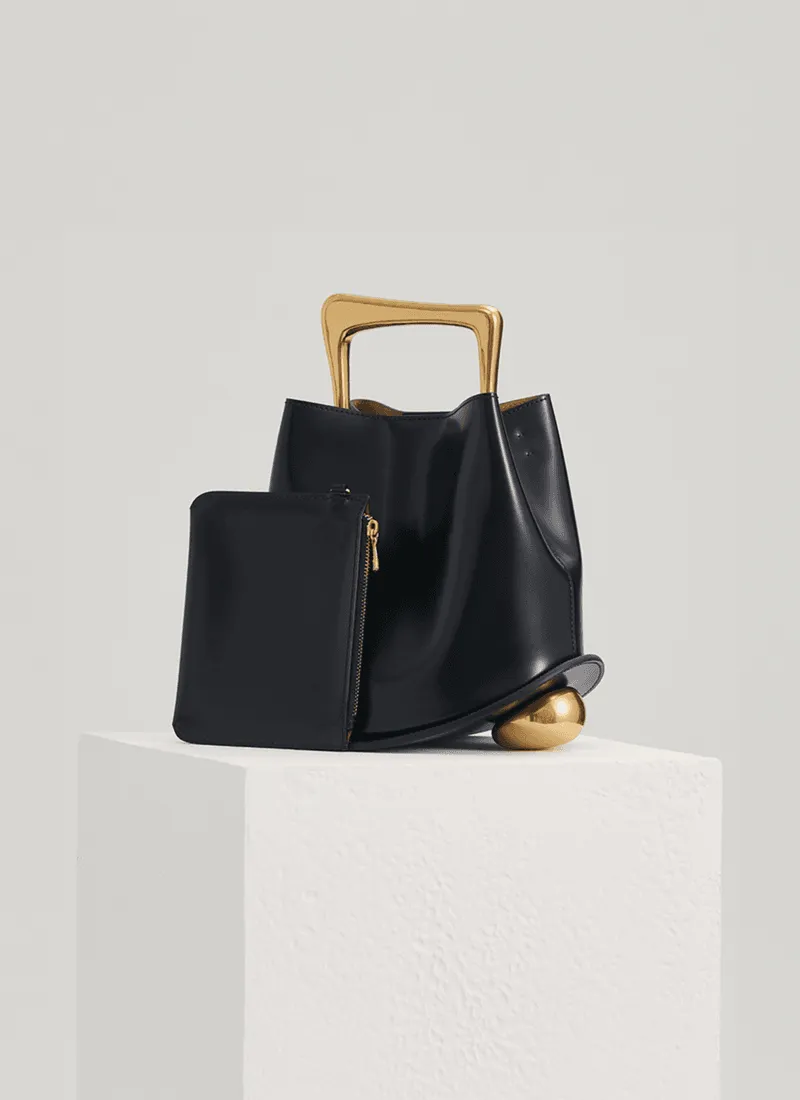 IT Ozzy Bag | Modern Chic Leather Shoulder Bucket Bag with Amber Acrylic Handles