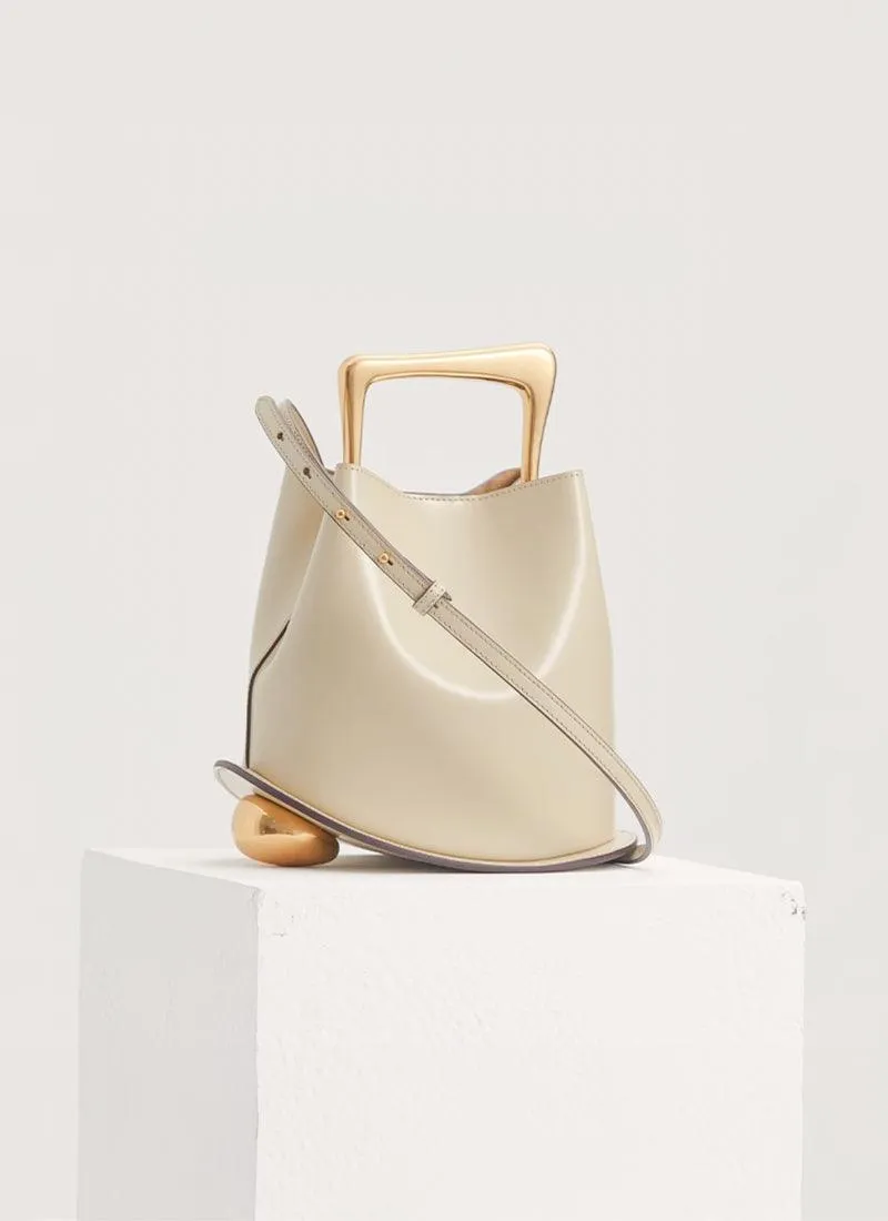 IT Ozzy Bag | Modern Chic Leather Shoulder Bucket Bag with Amber Acrylic Handles