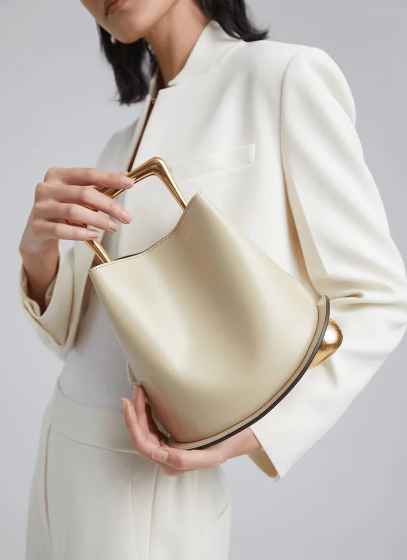 IT Ozzy Bag | Modern Chic Leather Shoulder Bucket Bag with Amber Acrylic Handles