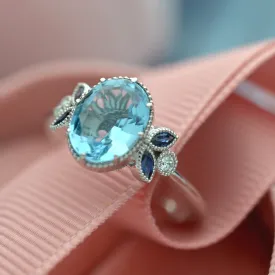 Jenn Oval Aquamarine or Morganite engagement ring with marquises